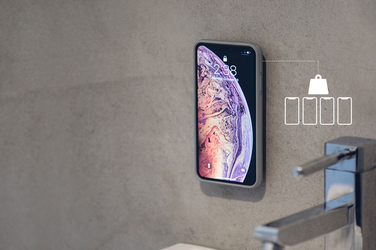La bande adhésive 3M peut supporter un poids maximal de 1 kg, suffisant pour supporter quatre grands iPhone.